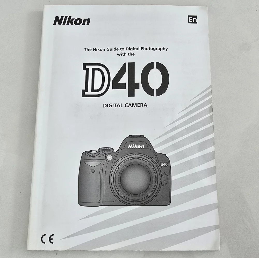 Nikon D40 Black Digital Camera with Two Lenses, Camera Bag And Charging Cord